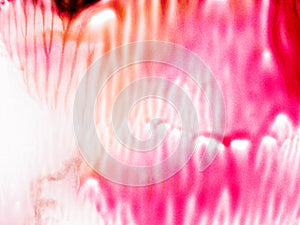 Blurred and grainy pink toned abstract background.