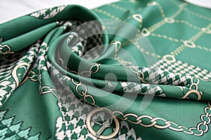 Blurred green fabric with houndstooth pattern