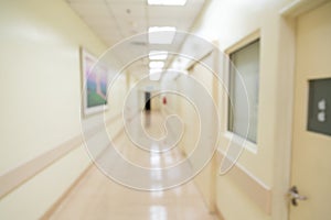 Blurred hospital indoor corridor hallway as background for graphic pursuit