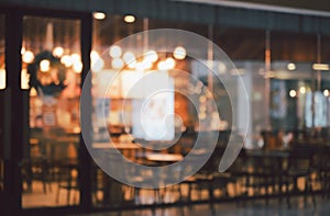 Blurred image of coffee shop with bokeh light background