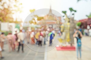 Blurred image, crowd of tourists at Wat Arun temple. Bangkok, Thailand.