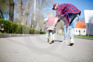 Blurred image of father, son ,