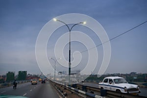 Blurred image, Howrah, West Bengal, India. 2nd Hoogly bridge, vidyasagar setu at blue hour. Monsoon stock image