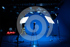 Blurred image of Professional video studio behind-the-scenes video footage behind silhouette production photography with a focus