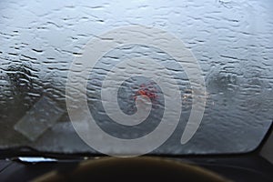 Blurred image of a raindrops on the windshield