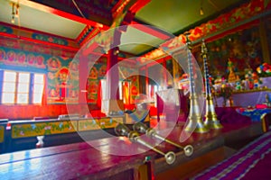 Blurred image, Rinchenpong, Sikkim, India. Religious statues of Buddhism at Rinchenpong monastery with decorated murals on the