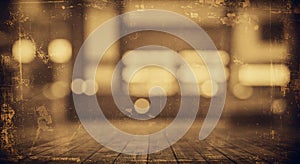 Blurred image with a sepia tone, featuring an indistinct background of lights photo