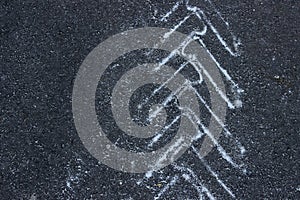 Blurred image of white sand track from car wheels. Abstract texture background.