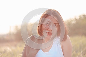 Blurred images of women sitting in the grasslands