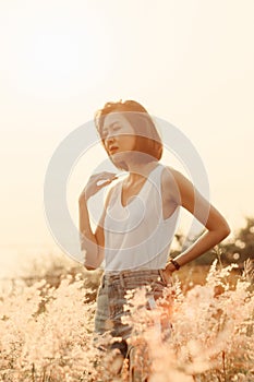 Blurred images of women sitting in the grasslands