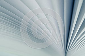 Blurred. A light background from the white pages of a white open book photo