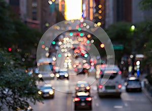 Blurred lights of cars and buses on 42nd Street in New York City