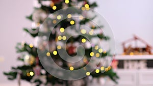 Blurred lights in Christmas tree at home
