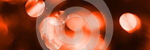 Blurred lights, dark orange abstract background banner
