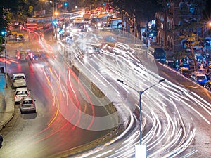 Blurred lights from traffic on Mumbai roads at night.