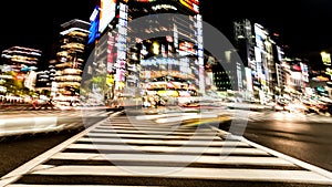 Blurred motion of cars, abstrakt motion blurry of city. Ginza crossing at night, Tokyo, Japan