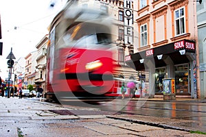 Blurred motion of the city tram on the street