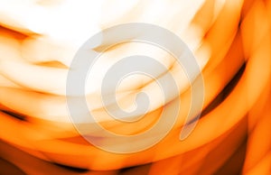 Blurred moving fire lights background, yellow, orange and white colors on black, abstract template for design, high resolution