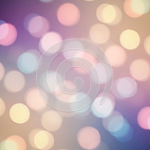 Blurred multicolored lights create a bokeh effect with soft, overlapping circles