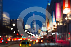 Blurred night lights of Manhattan street in New York City, NYC