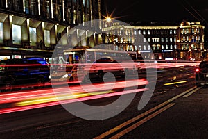 Blurred night traffic. Light trails on the road at night on Kamennoostrovskiy prospect in Saint-Petersburg, Russia.