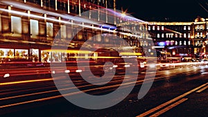 Blurred night traffic. Light trails on the road at night on Kamennoostrovskiy prospect in Saint-Petersburg, Russia.