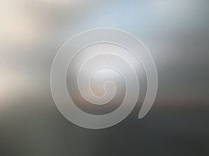 Blurred office glass with sand structure.