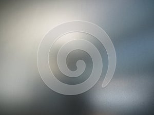 Blurred office glass with sand structure.