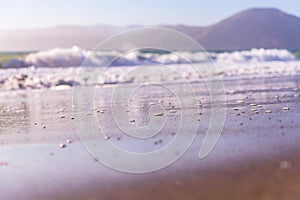 Blurred out Landscape of Bubble in the sand at Baker Beach San Francisco California photo