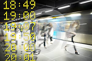 Blurred people on subway platform