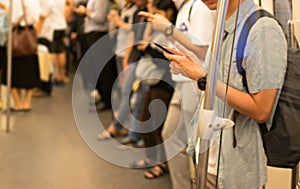 Blurred people using technology in everyday life