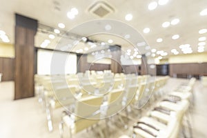 Blurred photo of empty interior of conference holl photo
