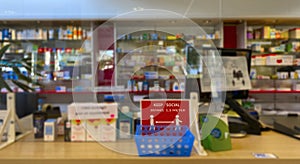 Blurred photo of Medicines arranged in shelves at pharmacy. Pharmacy during Covid-19