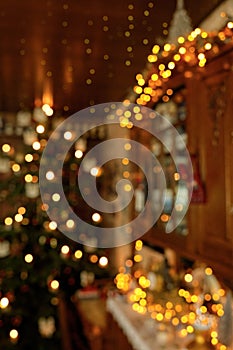 Blurred Portrait Christmas Impression with Decorated Cupboard, Fairy Lights and Christmas Tree