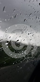 Blurred Rain on glass -Phone Wallpaper- photo