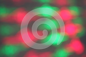 Blurred red and green lights on gray background
