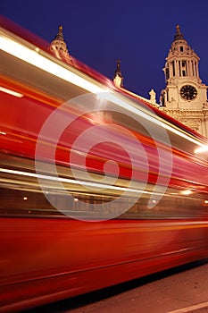 Blurred red London bus