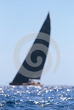 Blurred sailing boat background with neat soft waves mediterranean waters in palma de mallorcas bay photo