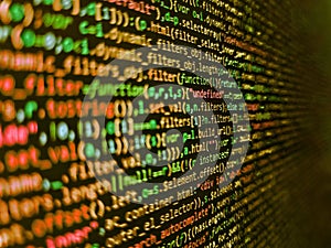 Blurred screen with selective focus. Information technology website coding standards for web design. Abstract computer script