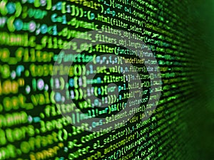 Blurred screen with selective focus. Information technology website coding standards for web design. Abstract computer script