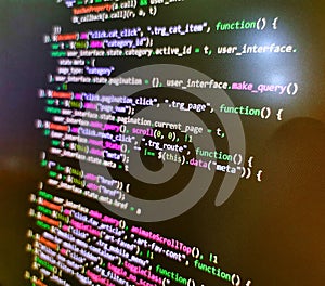 Blurred screen with selective focus. Programming code abstract screen of software developer. Developer software programming code.