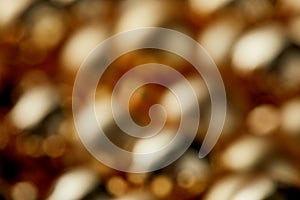 Blurred shiny golden Christmas baubles background