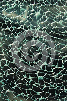 Blurred shot of broken glass. Broken window background.