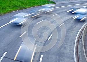 Blurred shot of cars driving on a four-laned road