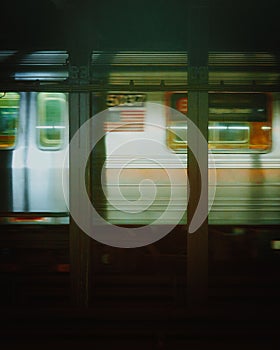 Blurred shot of a subway train rushing to the next station