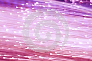 blurred sparking many pink and purple color light moving horizontal on black background