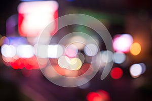 Blurred street lights, urban abstract background. defocused image of night city. Vehicles on the road.