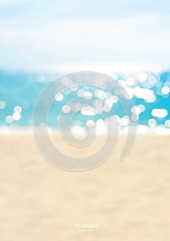 Blurred summer beach with sparkling seawater
