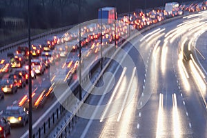 Blurred Tail Lights And Traffic Lights On Motorway