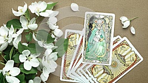 Blurred Tarot cards layout on witch table. Esoteric concept and astrology